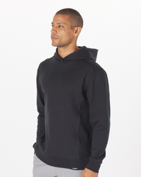 Black pullover hoodie with drawstring hood, shown on male model in side profile view.