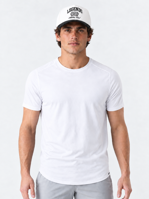 White crew neck t-shirt with short sleeves and curved hem, displayed on male model.