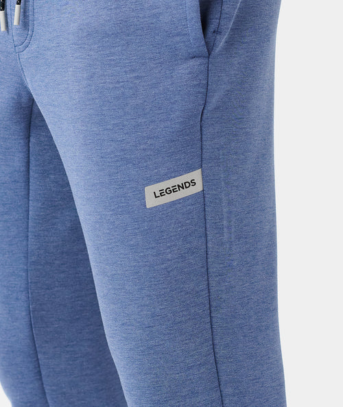 Heather blue joggers with "LEGENDS" woven label on thigh and side pocket detail.