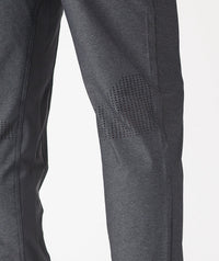 Charcoal gray pants with textured weave fabric and perforated detail on thigh.