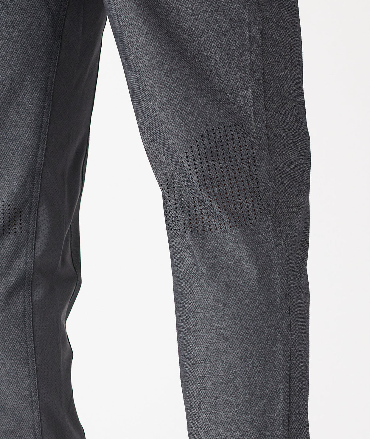 Charcoal gray pants with textured weave fabric and perforated detail on thigh.